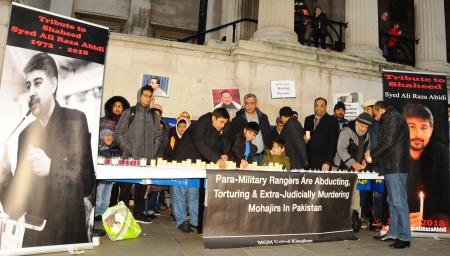 MQM pays rich tribute to slain Abidi through Candle Light Vigil