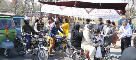 MQM MNA's MPA's and Workers distributing invitation for the Sufi-e-Kiram Convention in Lahore