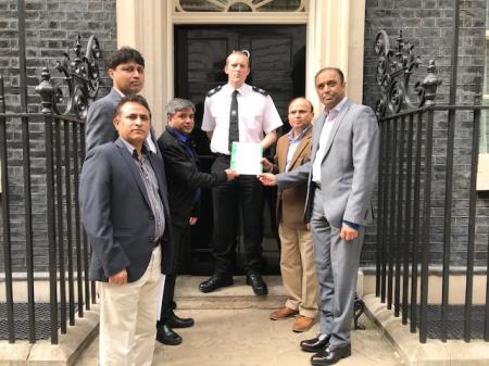 MQM HOLDS PROTEST AT 10-DOWNING STREET, PRESENTS MEMO CARRYING DETAILS OF INJUSTICES