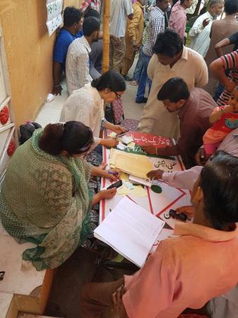 Pictures : Election Day Vote Casting in NA 245 and PS 115 