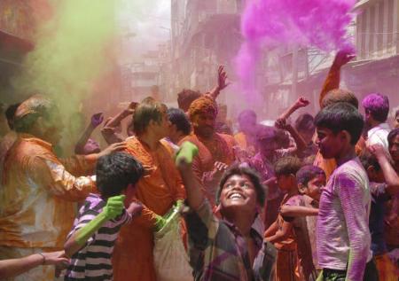 Members of the Hindu community celebrate Holi at Nine Zero
