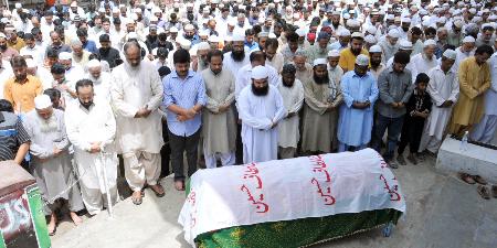 Victims of twin blasts outside the MQM election office laid to rest amid sobs and tears